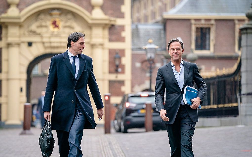 Wopke Hoekstra (CDA) en Mark Rutte (VVD) bij aankomst op het Plein voor het voortgangsgesprek met informateur Wouter Koolmees over de kabinetsformatie. beeld ANP, Bart Maat