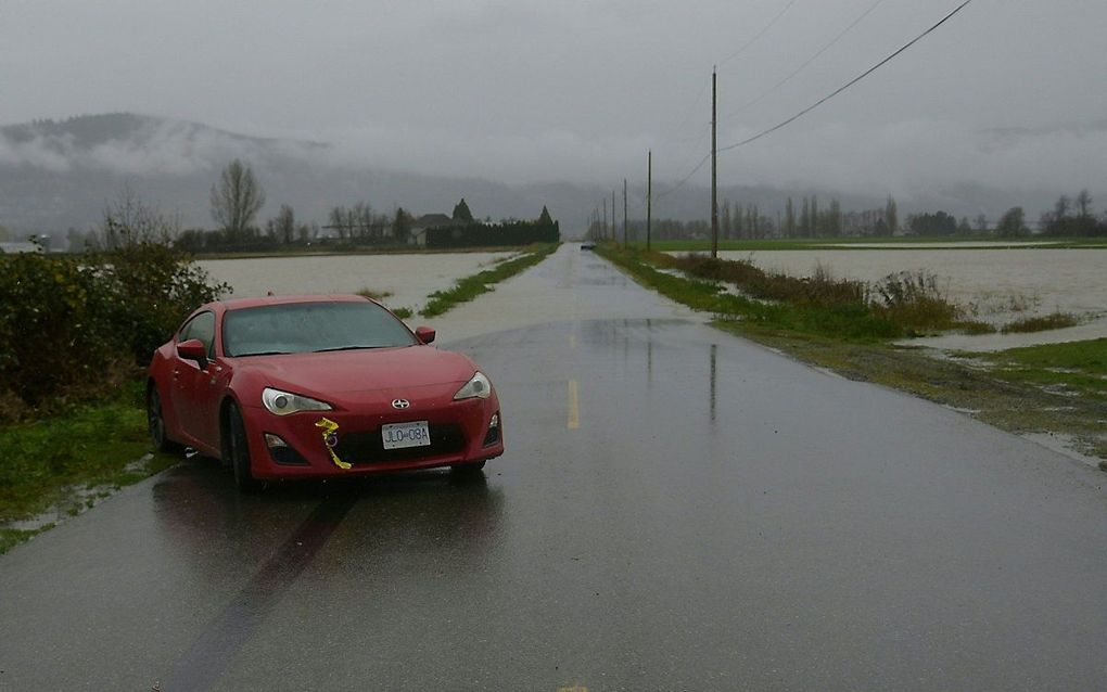 Een verlaten auto bij Abbotsford, British Columbia. beeld AFP, Philip McLachlan