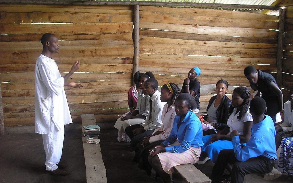 Kerkdienst in Uganda. beeld Jaco Klamer