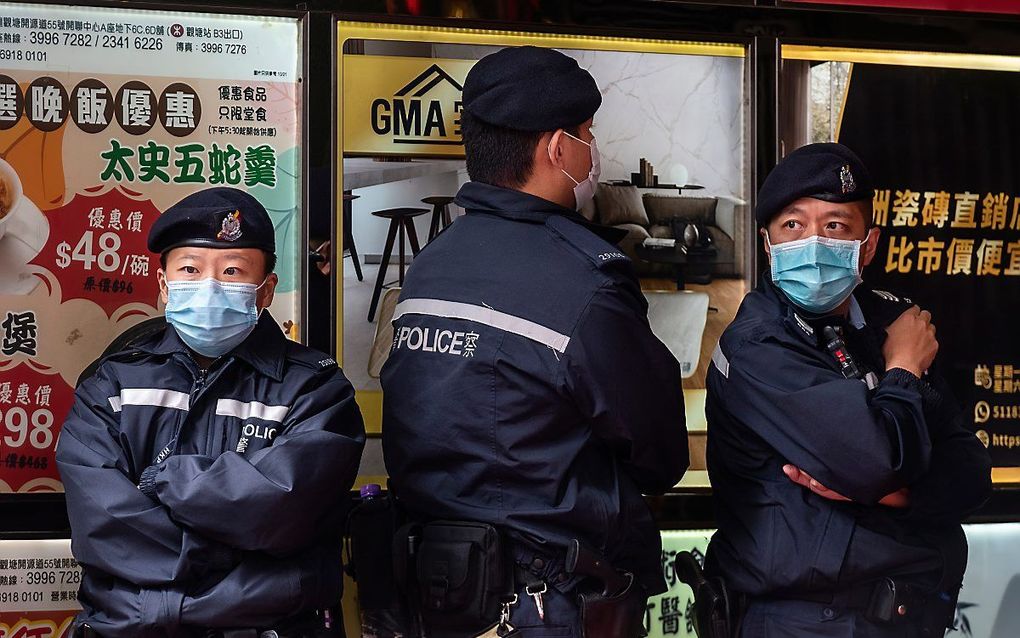 Politieagenten in China. beeld EPA, Miguel Candela