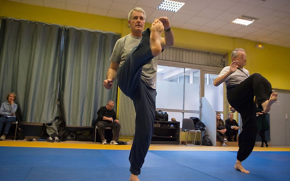 Franse patiënten met Parkinson in een sportles. beeld AFP, Bertrand Langlois