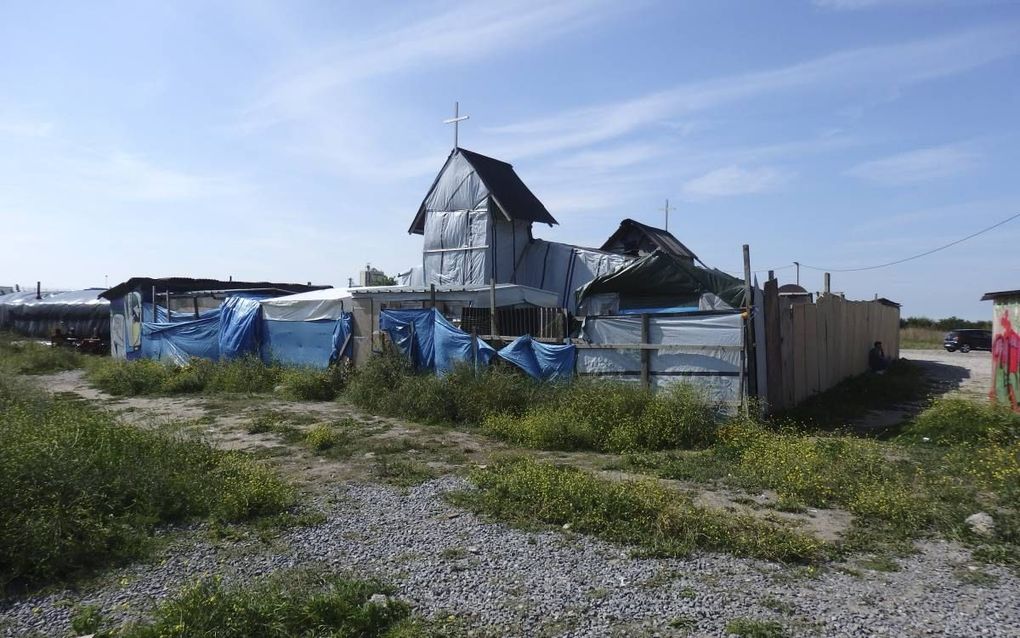 Een Ethiopisch-orthodox kerkje bij het vluchtelingenkamp in het Franse Calais. beeld RD