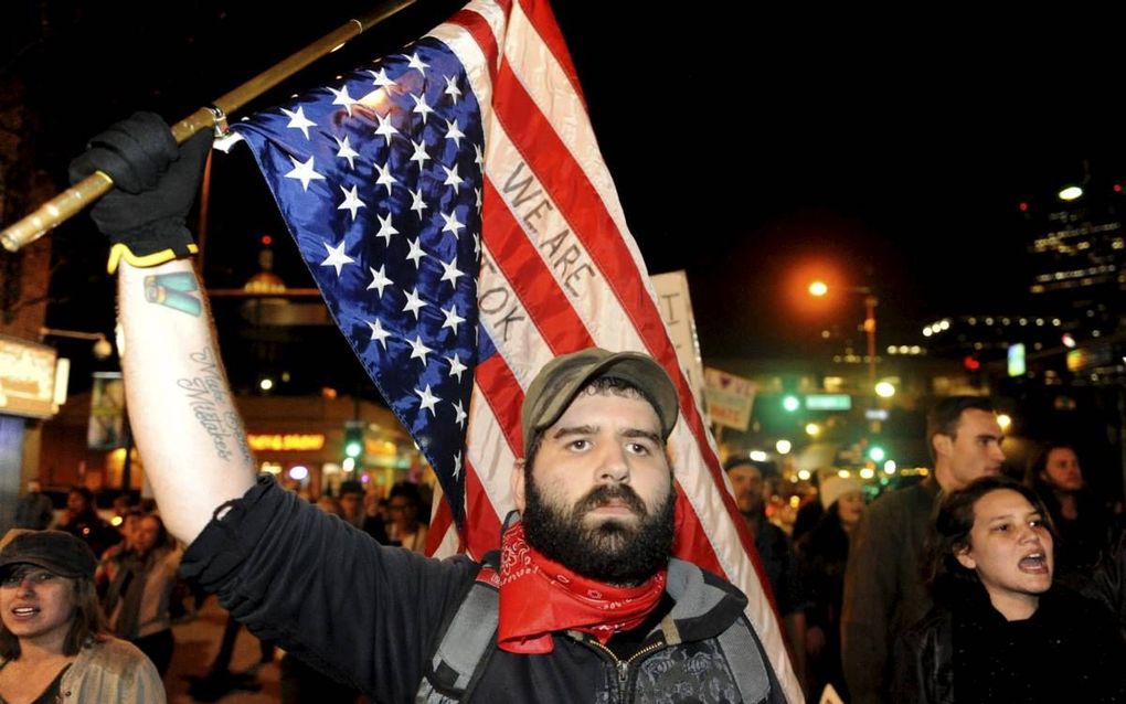 DENVER. Duizenden betogers in onder andere Denver (Colorado) demonstreerden deze week tegen hun kersverse president Donald Trump. beeld AFP,  Jason Connolly