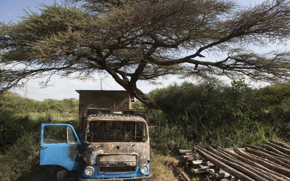 Woedende Ethiopiërs vielen tijdens de onlusten van de afgelopen maanden onder meer de Nederlandse firma Africa Juice aan en richtten er zware beschadigingen aan. beeld AFP, Zacharias Abubeker