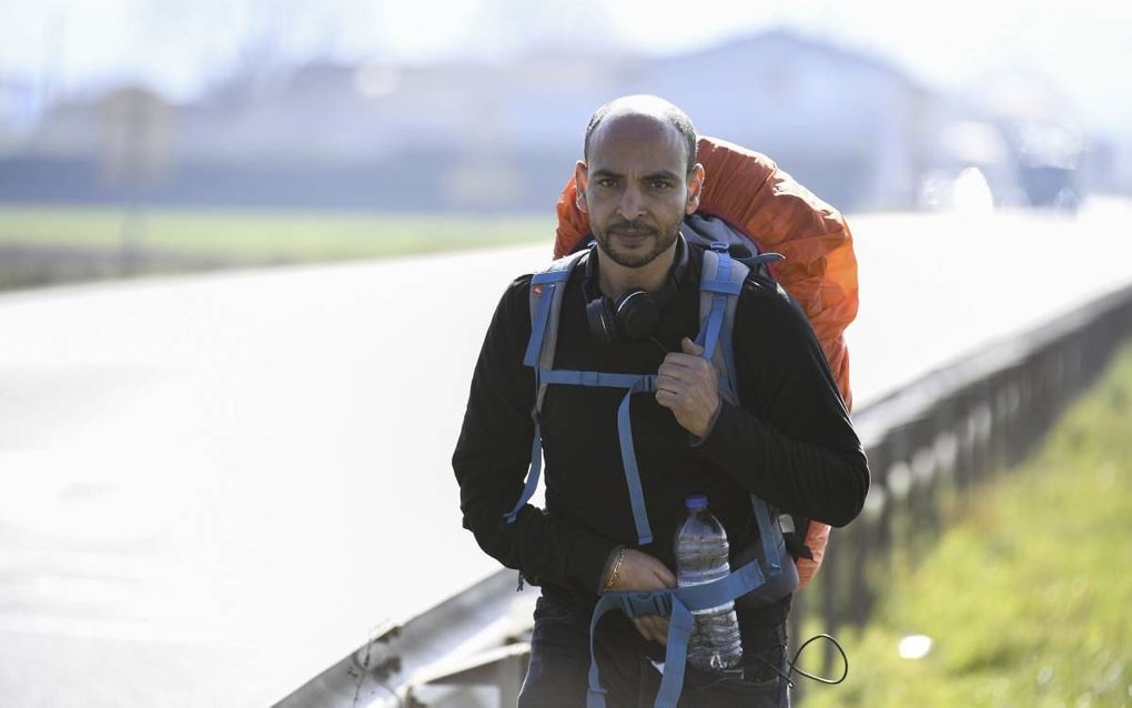 Abdelghani Merah, broer van een terrorist, maakt een lange mars door Frankrijk om aandacht te vragen voor de toenemende invloed van de radicale islam onder Franse moslimjongeren in achterstandwijken. beeld AFP, Philippe Desmazes