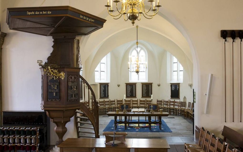 „Ik meen dat er toch wel een principieel verschil is tussen een van Godswege geroepen predikant die het ambt van herder en leraar bekleedt, en dat van organist of koster.” beeld RD, Anton Dommerholt