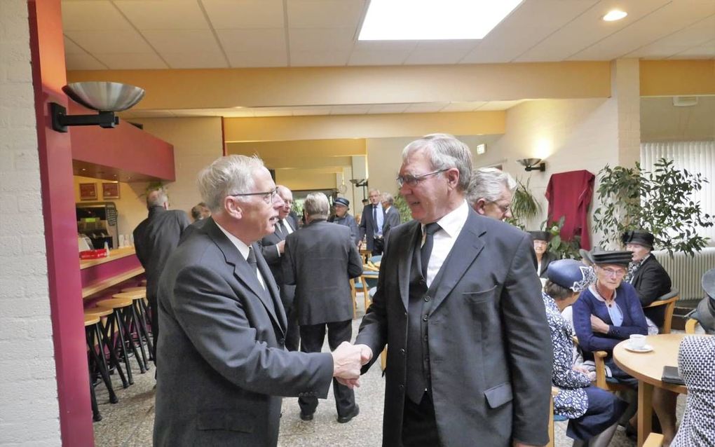 Moment tijdens de ontmoetingsdag in Ede. Links ds. A. den Hartog, een van de sprekers. beeld Jan van Reenen