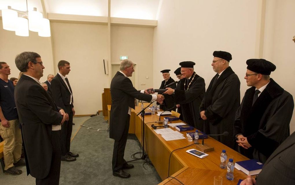 Aan de Theologische Universiteit Apeldoorn promoveerde de theoloog Peter Spies woensdag op een onderzoek naar het verloop van de Reformatie in de Neder-Betuwe.  beeld RD, Anton Dommerholt