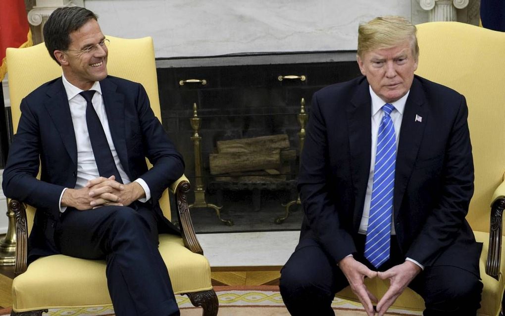 Rutte en Trump, beeld AFP, Brendan Smialowski.