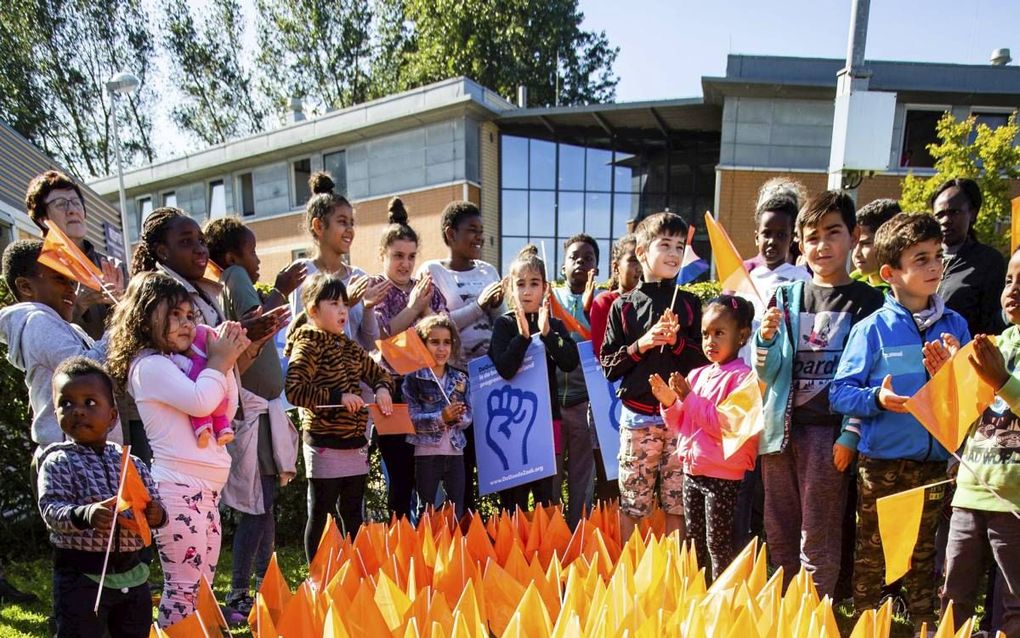 Demonstranten van De Goede Zaak en Defence for Children betoogden woensdag tegen het uitzetten van kinderen die inmiddels in Nederland geworteld zijn. beeld ANP, Alexander Schippers