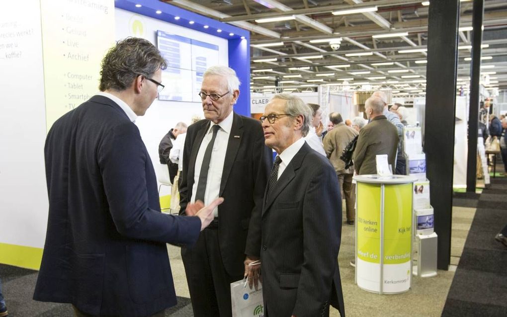 In de Jaarbeurs te Utrecht vond vrijdag en zaterdag de Kerkenbeurs 2019 plaats. Ook John Mastenbroek (l.) en M. Slingerland bezochten de vakbeurs. „Ik ben, zoals bekend, altijd hevig geïnteresseerd in alles wat er op kerkelijk terrein gebeurt”, aldus Mast