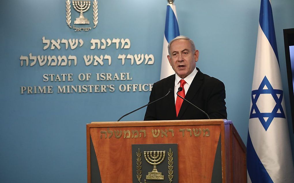 Premier Netanyahu tijdens een persconferentie, maandag. beeld EPA, Yonatan Sindel