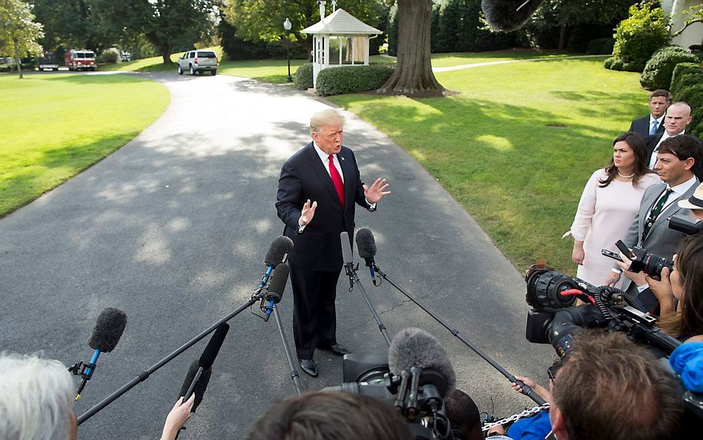 President Trump staat de pers te woord. beeld EPA