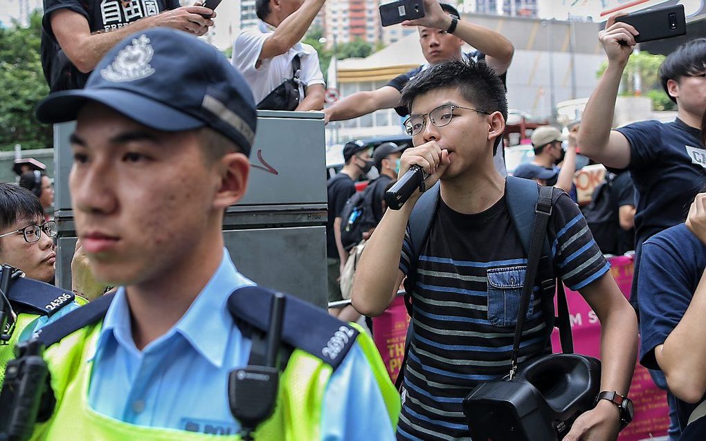 Joshua Wong (R). beeld EPA