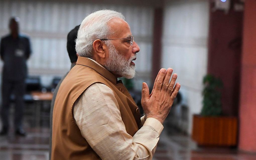 De Indiase premier Narendra Modi arriveert bij het parlementsgebouw in New Delhi. beeld AFP, Prakash Singh