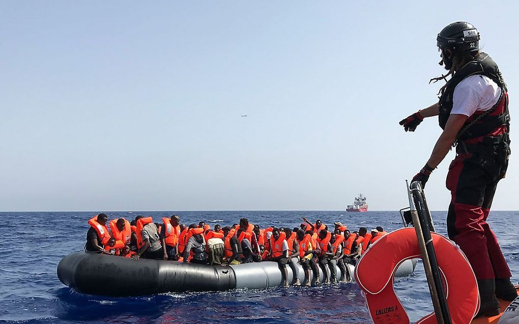 Migranten bij de Griekse eilanden op een foto van 9 augustus. beeld AFP