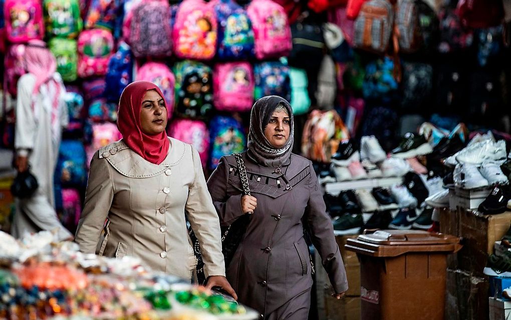 Markt in de Syrische stad Qamishli, 10 september. beeld AFP, Delil Souleiman