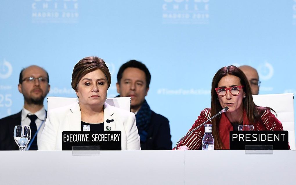 Bedrukte gezichten tijdens de moeizame onderhandelingen in Madrid. beeld AFP, Oscar del Pozo