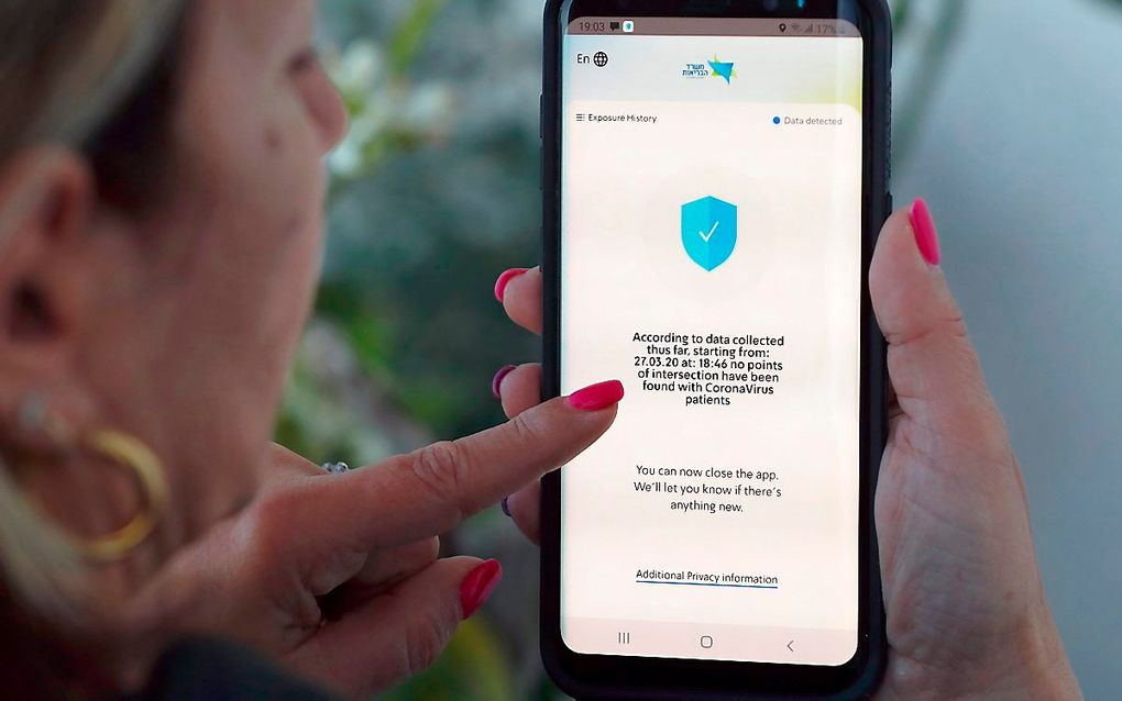 Israëlische app die gebruikers informeert over mogelijke contacten met dragers van het coronavirus. beeld AFP, Jack Guez