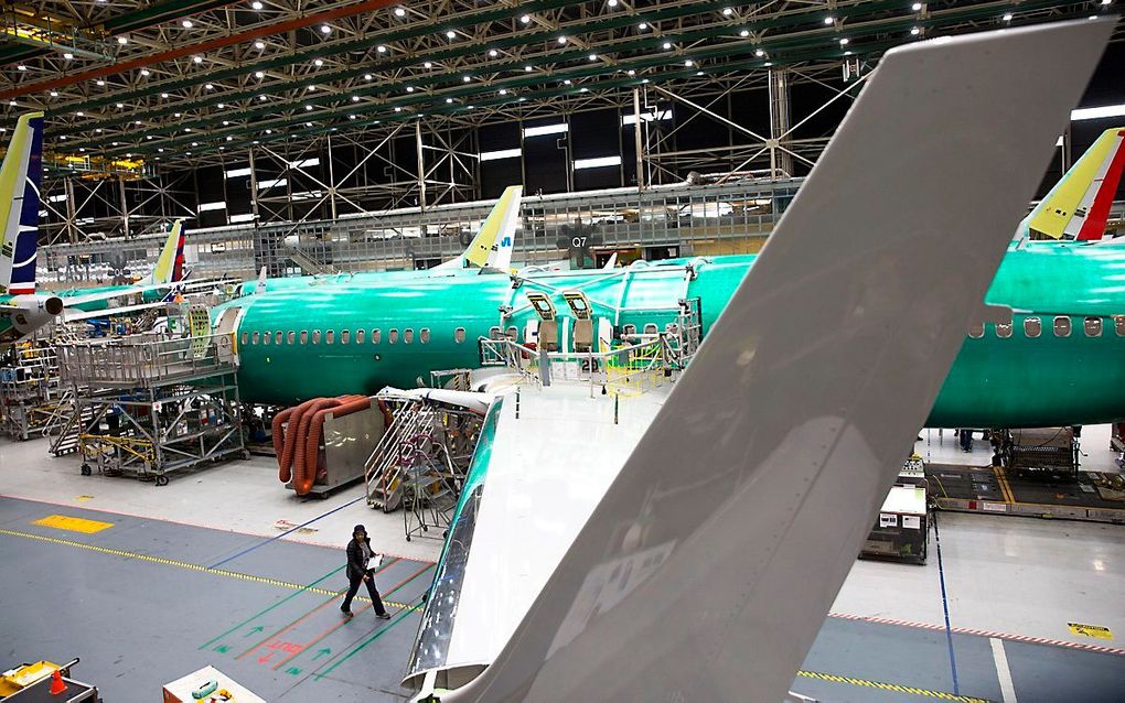 Werkzaamheden in een fabriek van Boeing. De vliegtuigbouwer heeft personeelsleden een vrijwillige vertrekregeling aangeboden. beeld AFP, Jason Redmond