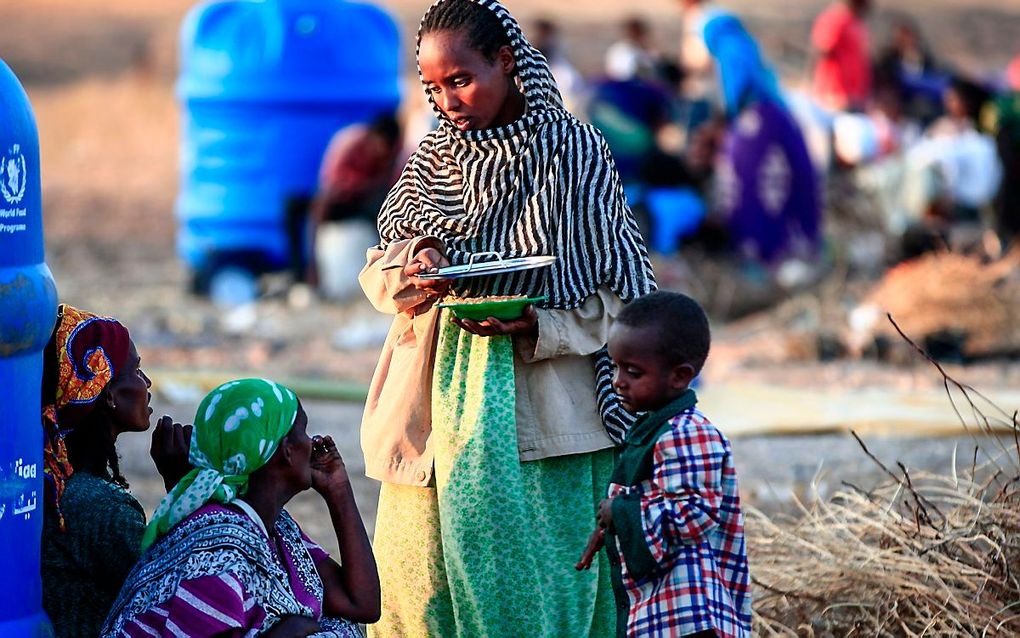 Een Ethiopiër die het geweld in Tigray ontvluchtte in een opvangcentrum in Hamdiyet, in de Sudanese staat Kasala. beeld Ebrahim HAMID / AFP