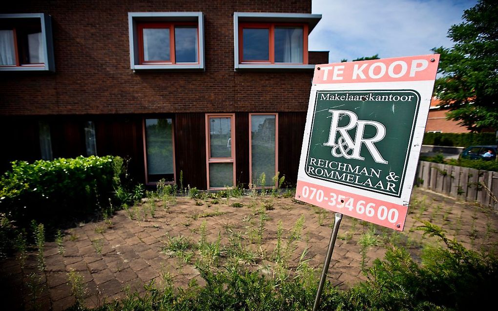 Verkoopbord bij een woning. beeld ANP