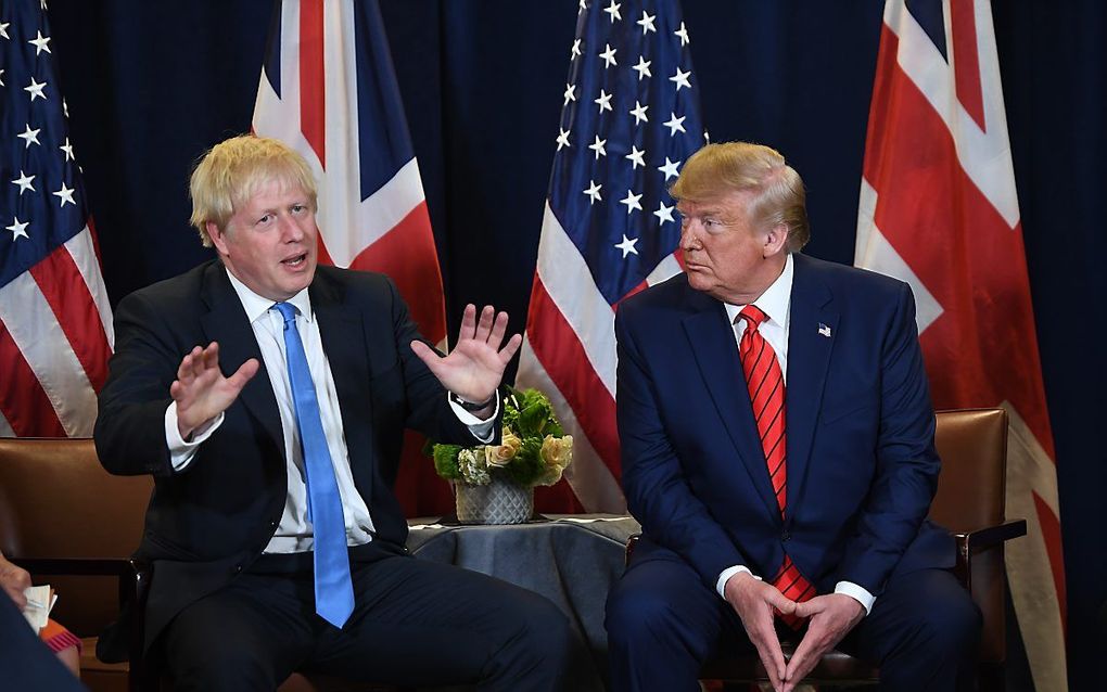 Boris Johnson (links) en Donald Trump. beeld AFP