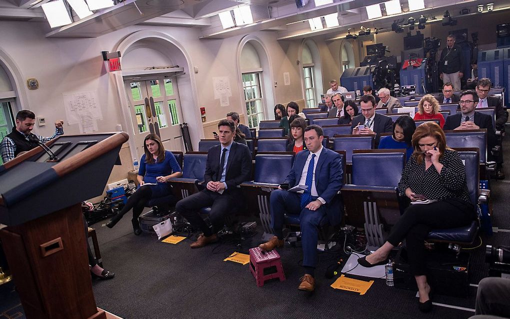 Amerikaanse journalisten in de persruimte van het Witte Huis. beeld AFP