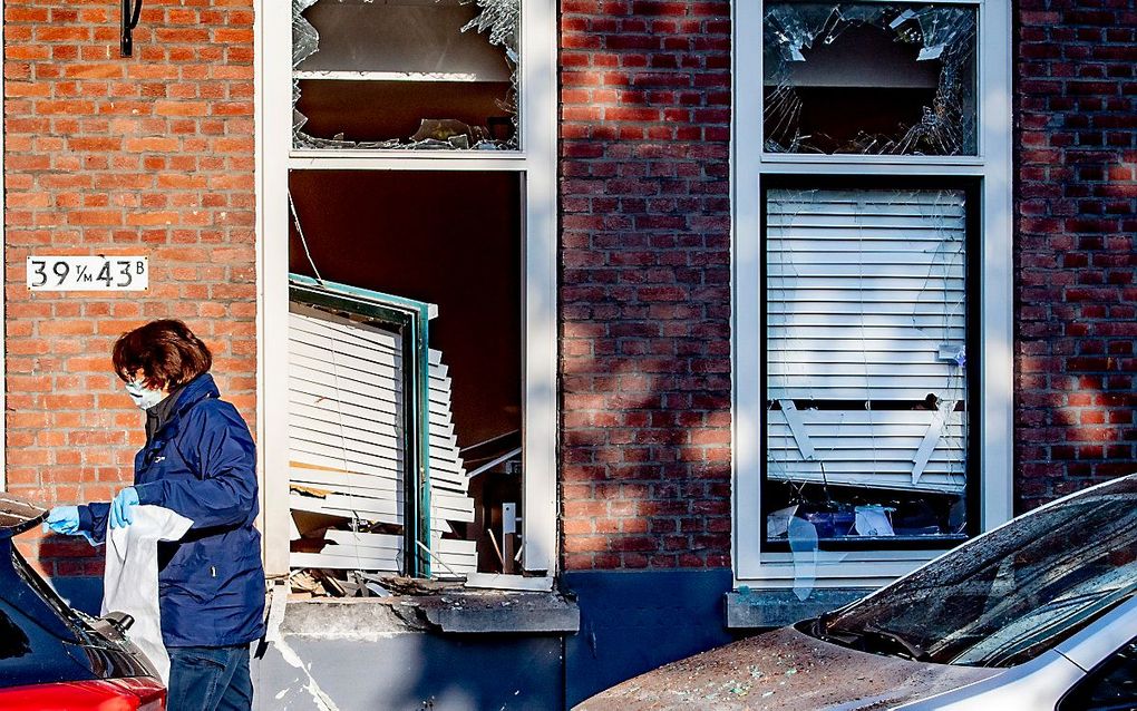 Onderzoek bij een woning in de Jagthuisstraat in Rotterdam-West. beeld ANP