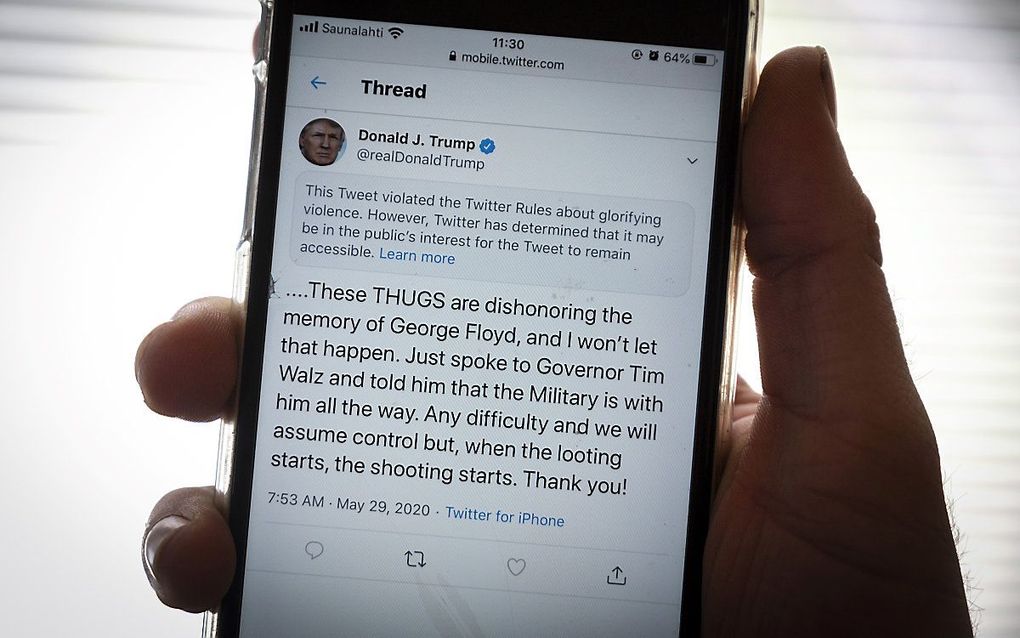 Twitter plaatst een waarschuwing bij een tweet van de Amerikaanse president. beeld AFP