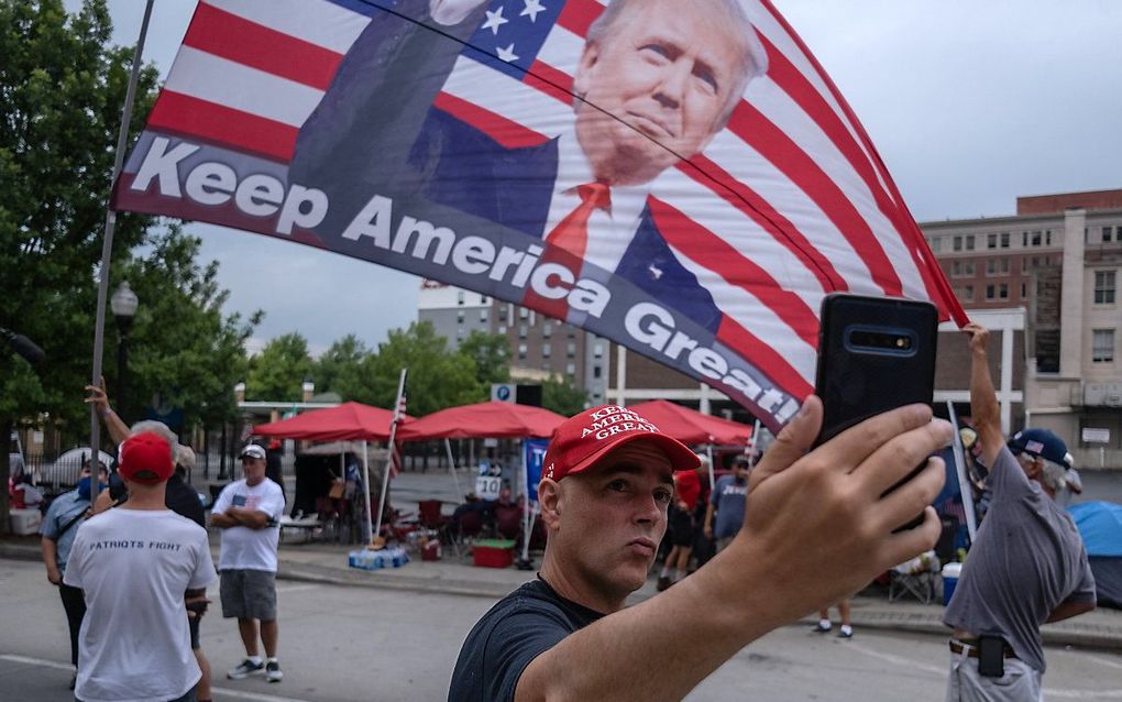 Een aanhanger van Trump in Tulsa. beeld AFP