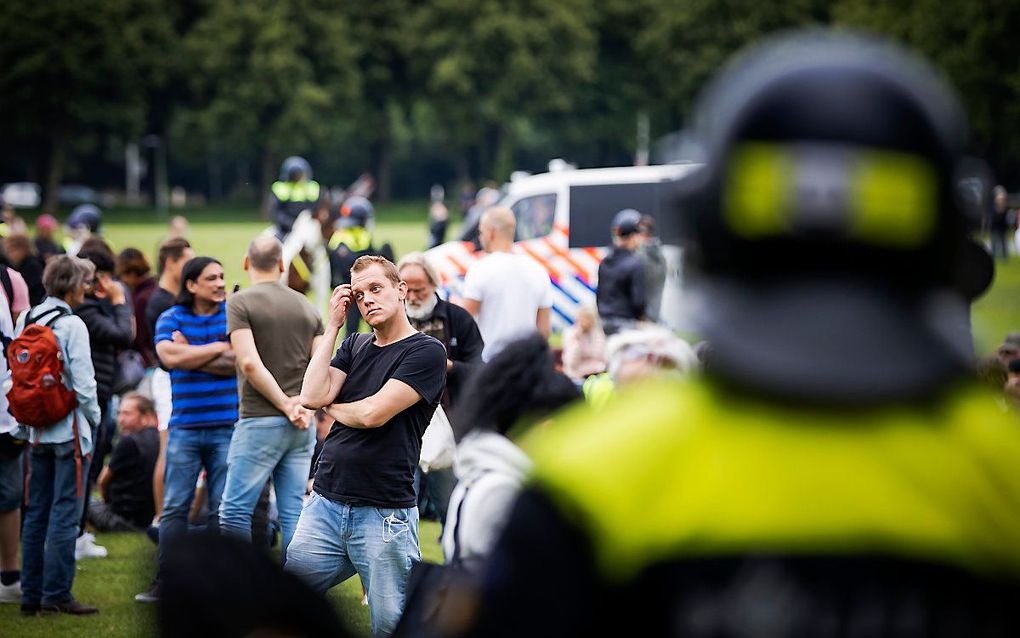 Demonstranten worden afgevoerd met bussen op het Malieveld. beeld ANP