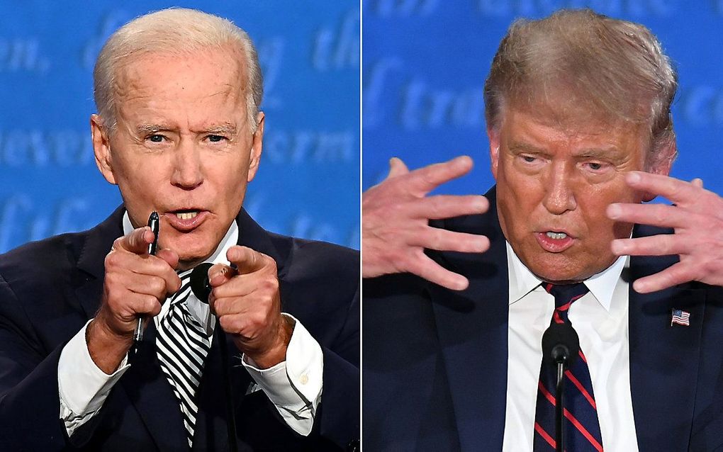 De Amerikaanse president Donald Trump (R) en zijn Democratische uitdager Joe Biden tijdens het eerste verkiezingsdebat. beeld AFP, Jim Watson