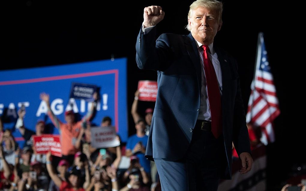 Trump noch de meeste aanwezigen droegen een mondkapje. beeld AFP, SAUL LOEB