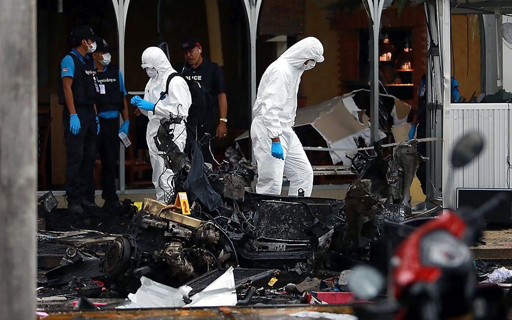 Onderzoek op de plaats van de explosie. beeld EPA