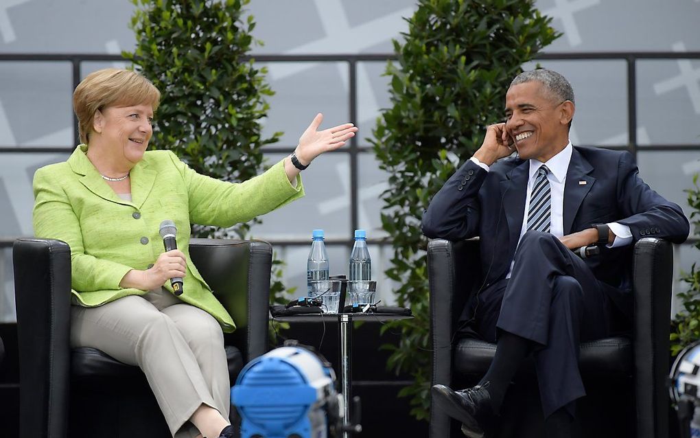 Obama en Merkel in Berlijn. beeld EPA