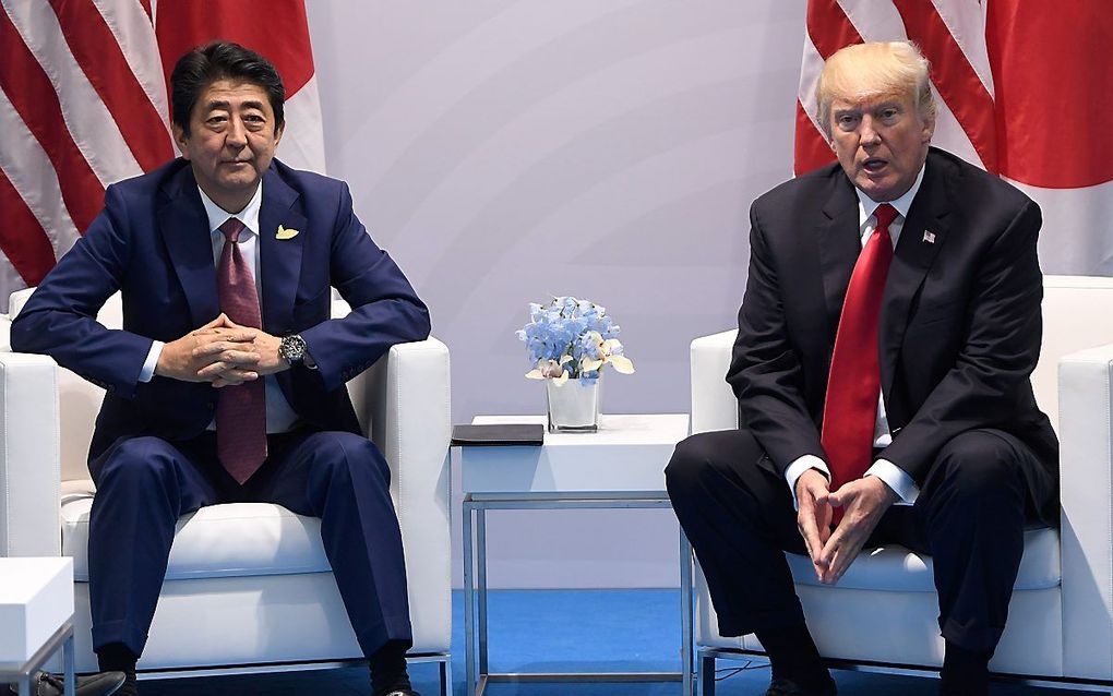 Trump en Abe. beeld AFP