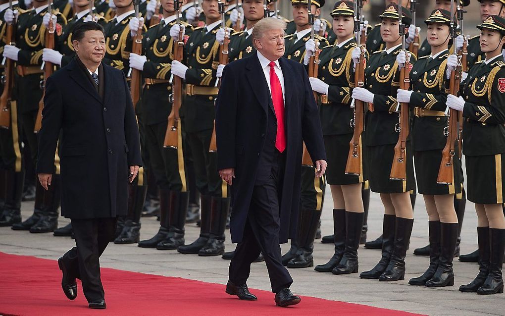 Trump en Xi in Peking. beeld AFP