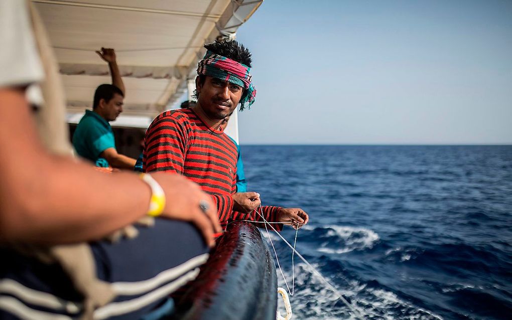 Migranten op zee. beeld AFP