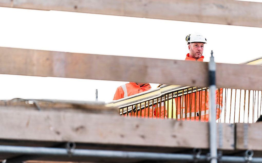 Bouwvakkers aan het werk. beeld ANP, Freek van den Bergh