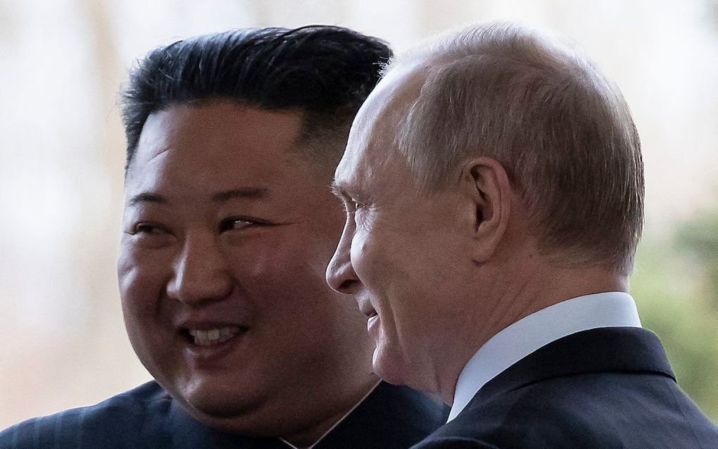 Kim (l.) en Poetin. beeld AFP