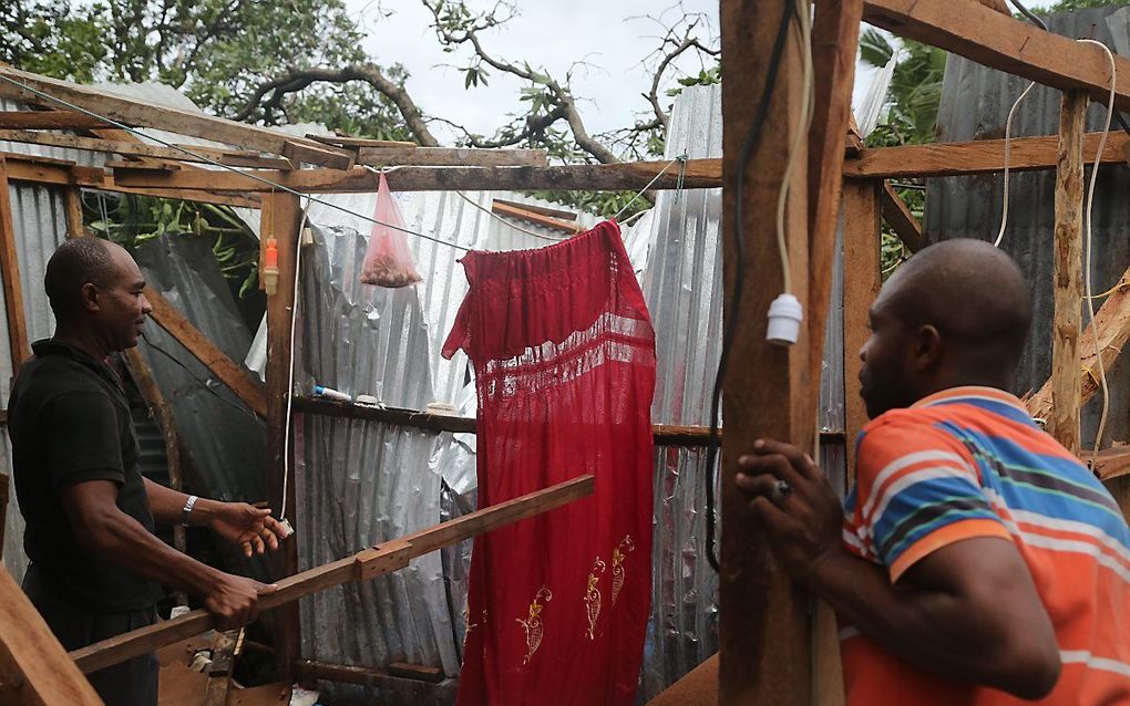 Schade aan een gebouw in Moroni, Mozambique. beeld AFP