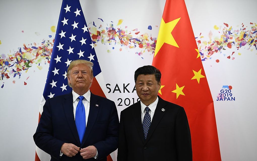 Donald Trump en Xi Jinping. beeld AFP