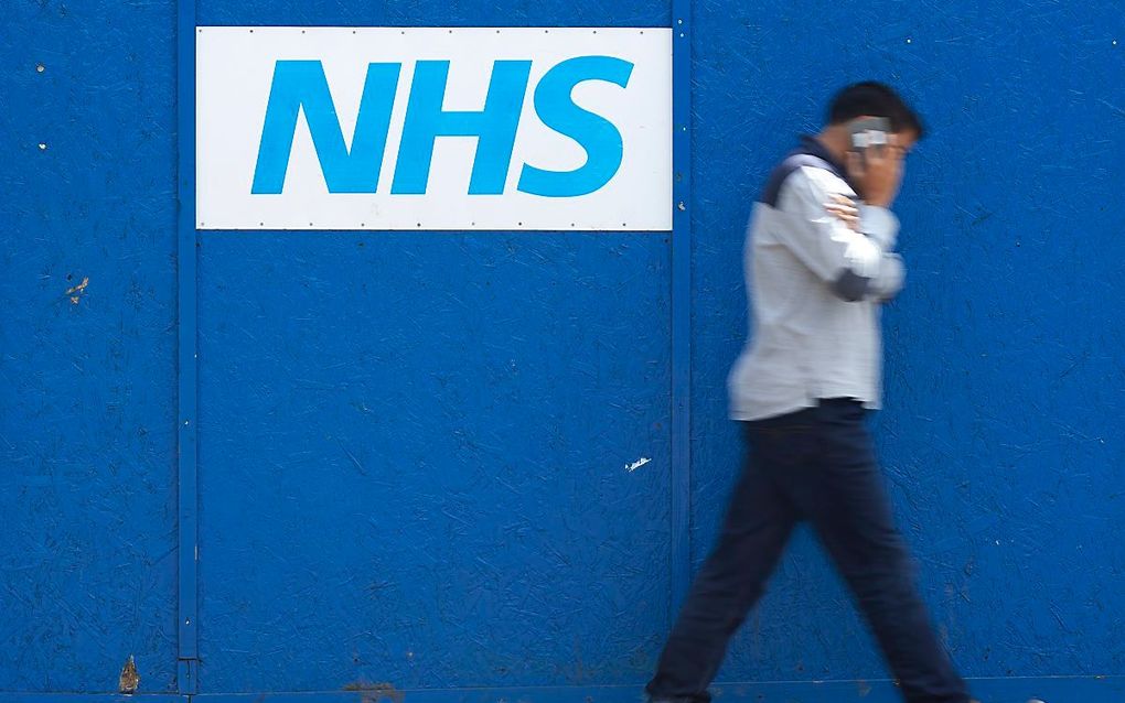 Het logo van de Britse gezondheidsdienst NHS. beeld AFP