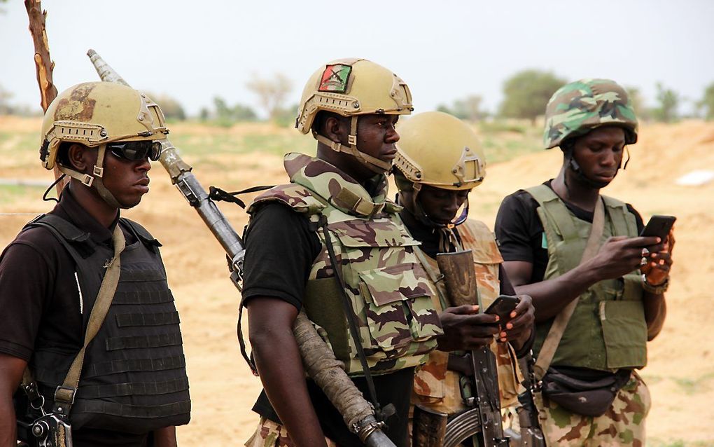 Een groep Nigeriaanse soldaten in Baga, Nigeria. beeld AFP