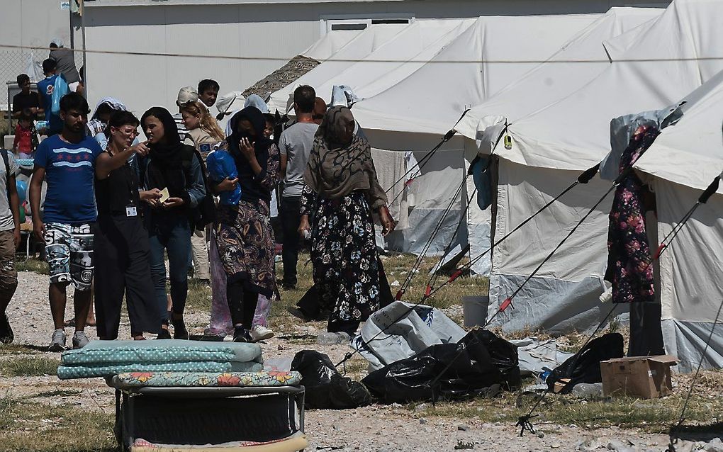 In het vluchtelingenkamp op Lesbos zitten meer dan 10.000 vluchtelingen. beeld AFP, Sakis Mitrolidis