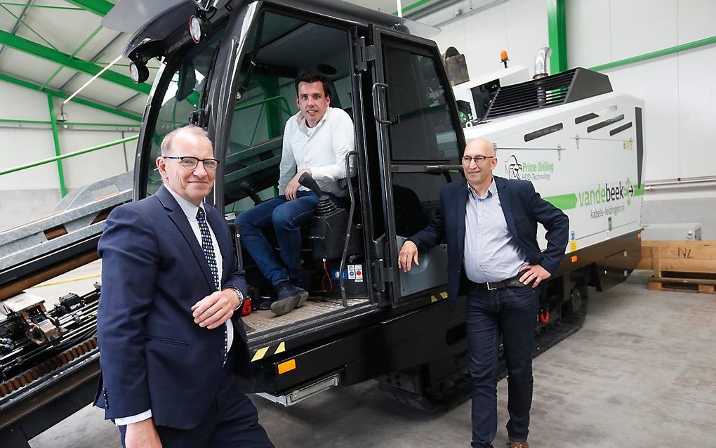 V.l.n.r. Teun van Sligtenhorst (Gomarus), directeur Arie van de Beek en Leo Dane (Gilde). beeld VidiPhoto