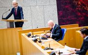 Geert Wilders (PVV), Ferdinand Grapperhaus, demissionair minister van Justitie en Veiligheid, en demissionair premier Mark Rutte tijdens het debat in de Tweede Kamer over de nieuwe spoedwet over de avondklok. beeld ANP, SEM VAN DER WAL