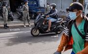 Indonesië heeft de prik tegen het coronavirus verplicht. beeld EPA, Made Nagi