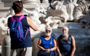 Toeristen bij de Trevifontein in Rome. beeld ANP, Sem van der Wal